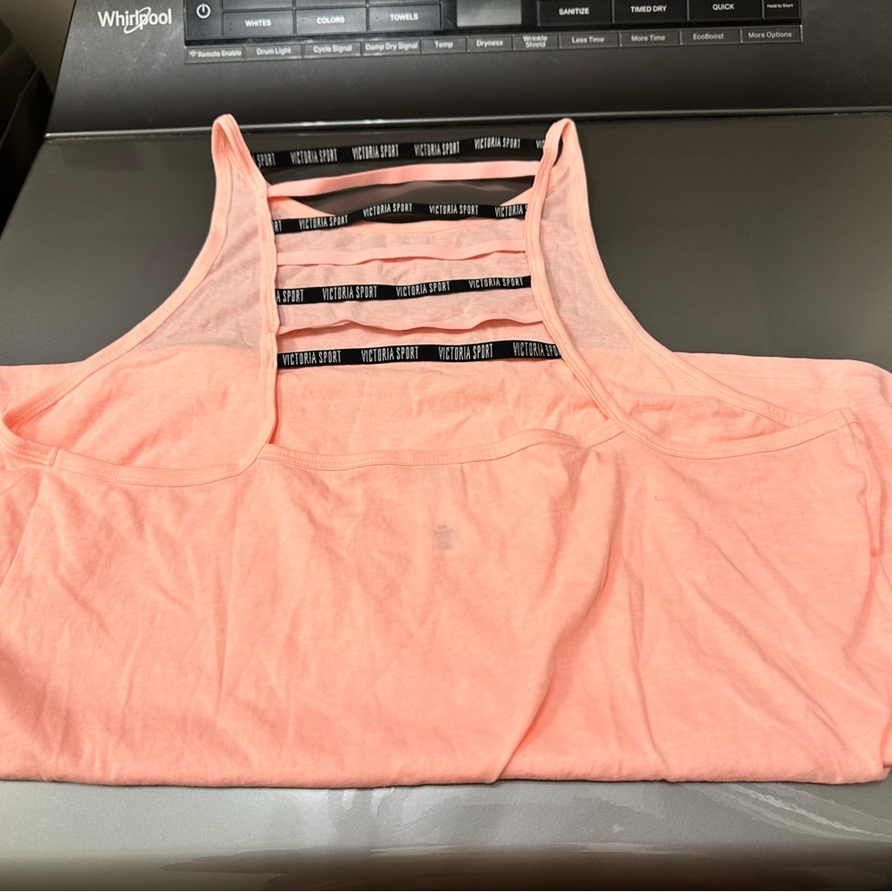 NWOT VSX peachy-pink workout tank with fun strappy back detail size L